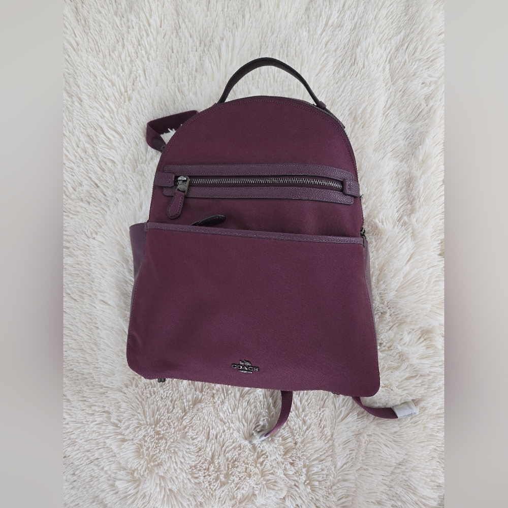 Purple Coach diaper backpack bag
